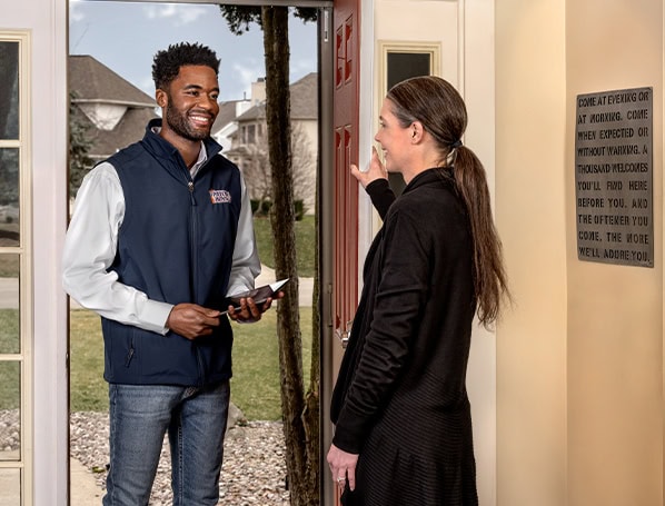 Worker talking to customer