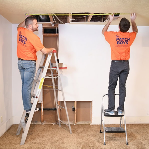 workers fixing ceiling