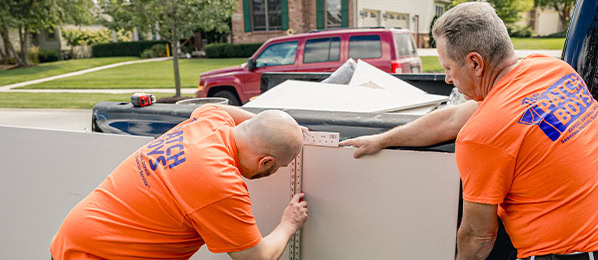 workers inspecting drywall
