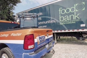 The Patch Boys of Greater Fayetteville with the with the Food Bank of Central & Eastern North Carolina