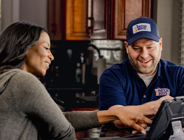 Technician talking to customer